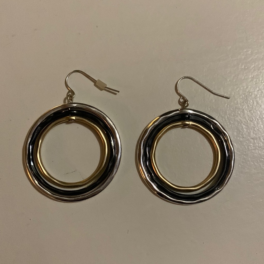 Chicos earrings, gold, silver, black.  1 1/2” in diameter.